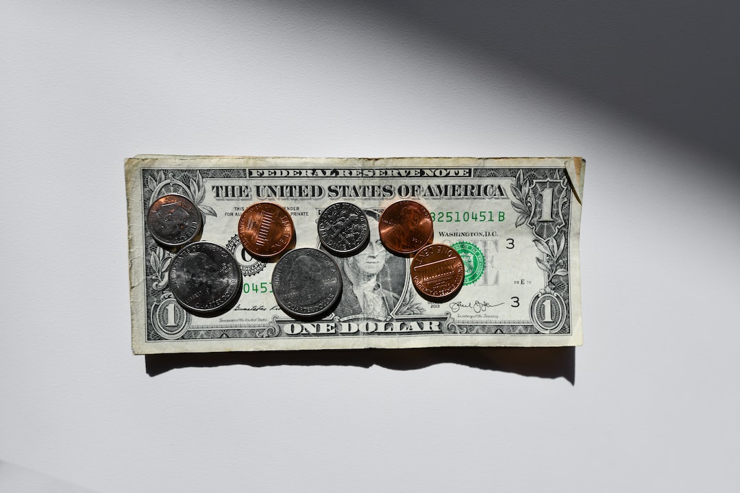 New York worker reviewing a paycheck reduced by a wage garnishment