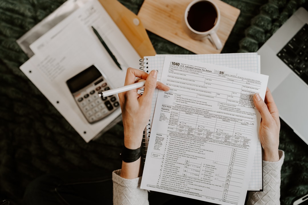Reviewing bankruptcy exemption paperwork with a calculator to avoid exemption mistakes in New York