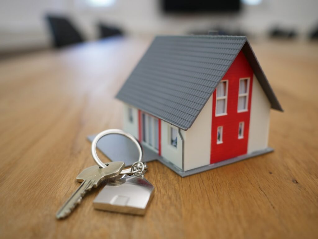 Homeowner receiving house keys after resolving mortgage trouble through a loan modification during bankruptcy in New York